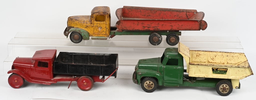 3- PRESSED STEEL DUMP TRUCKS (1 of 4)