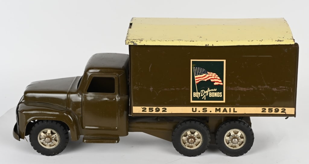 BUDDY L BUY DEFENSE BONDS TRUCK: All original with very nice paint and decals. Has Buy Defense Bonds decals. Complete with roof and rear doors. 20" Excellent