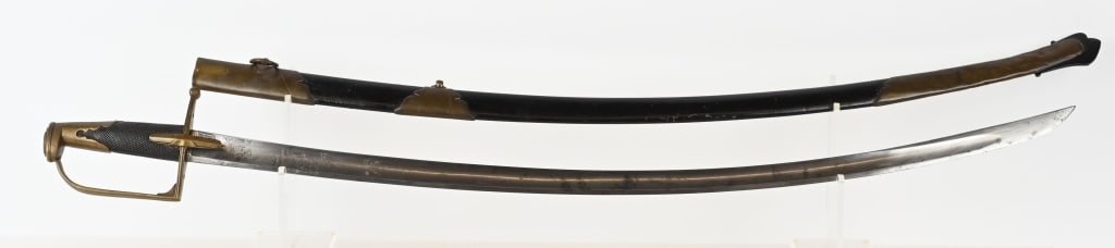 EARLY FRENCH HUSSAR OFFICER’S SWORD WITH SCABBARD: This Napoleonic era sword is in fine condition. The upper part of the blade retains its original etching. The balance of the blade is in excellent condition showing its original polish with a large bl