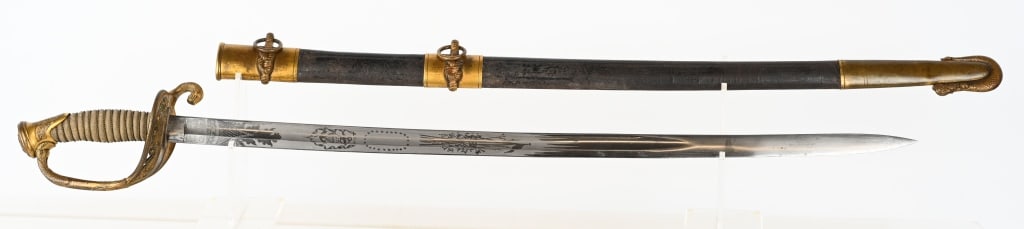 CIVIL WAR M1852 US NAVY SWORD AND SCABBARD USN: A very fine and handsome Civil War era Model of 1852 Naval Officers Sword and Scabbard by Ames of Chicopee Mass. The sword is a Civil War era sword with the wider blade and heavier mounts of the perio