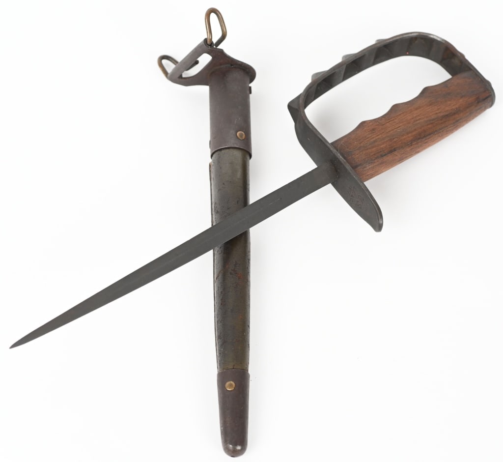 WW1 US ARMY M1917 KNUCKLE KNIFE LF&C WWI: U.S. World War 1 1917 L.F.& C. trench knife in near mint condition. This knife measures 14" overall. The blade itself measures 9". This knife has 6 point knuckle guard. 'U.S. L.F.&C. 1917' is stamped 