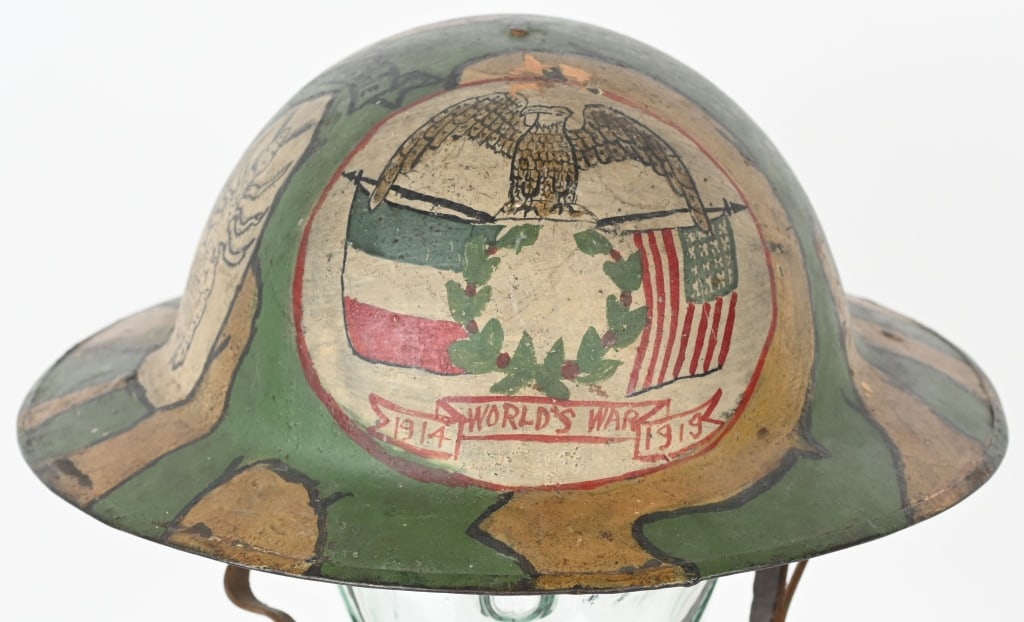 WWI US CAMO PAINTED HELMET PATRIOTIC LIBERTY SHIP: Top Shelf WW1 US British Made Camo Painted Helmet that is painted in Green and Tan painted with a Federal Eagle on top of a Laurel Wreath with crossed American and French flags. To the side A.E.F. Coo