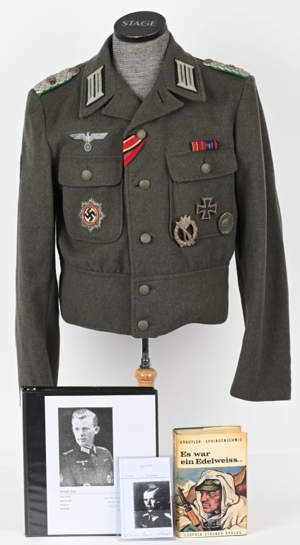 WWII NAZI GERMAN GEBIRGSJÄGER TUNIC GERMAN CROSS: Waist length field-gray wool/rayon blend construction field blouse with a vertical six button front closure, small fold back lapels and a lay down collar. The field blouse has two non-pleated patch br
