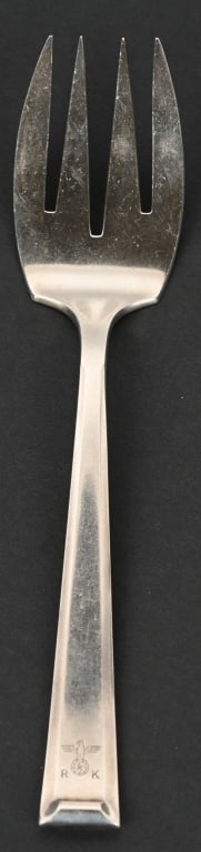 WWII NAZI GERMAN REICKSKANZLEI SALAD FORK WW2: A scarce salad fork retrieved from the official table service of the Reichs Chancellery, constructed of silver, the obverse featuring four prongs. The handle demonstrating a NSDAP-style German nationa