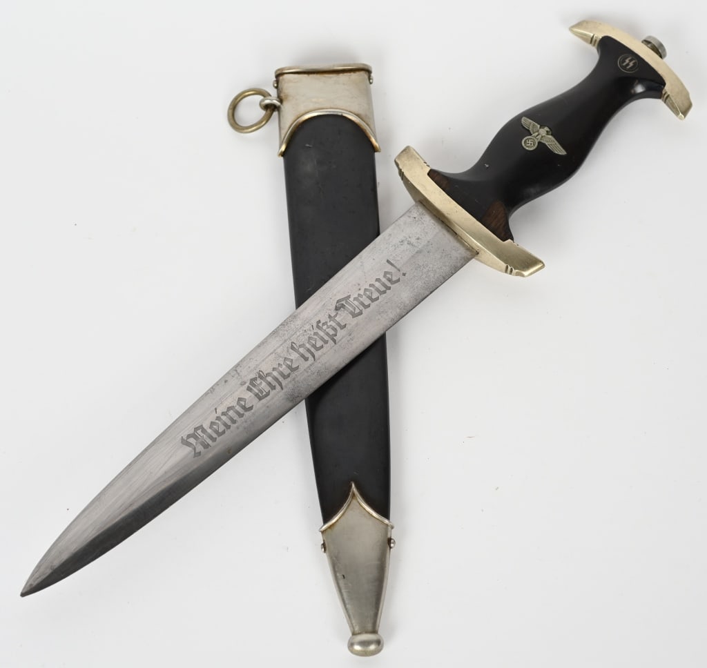 WWII NAZI GERMAN SS DAGGER KLITTERMANN & MOOG #ED: Rare Maker! Original SS EM Dagger With Exclamation Point RZM M7/29 By Klittermann & Moog. Nickel/silver plated blade shows the typical light scabbard runners and minimal light surface spotting an