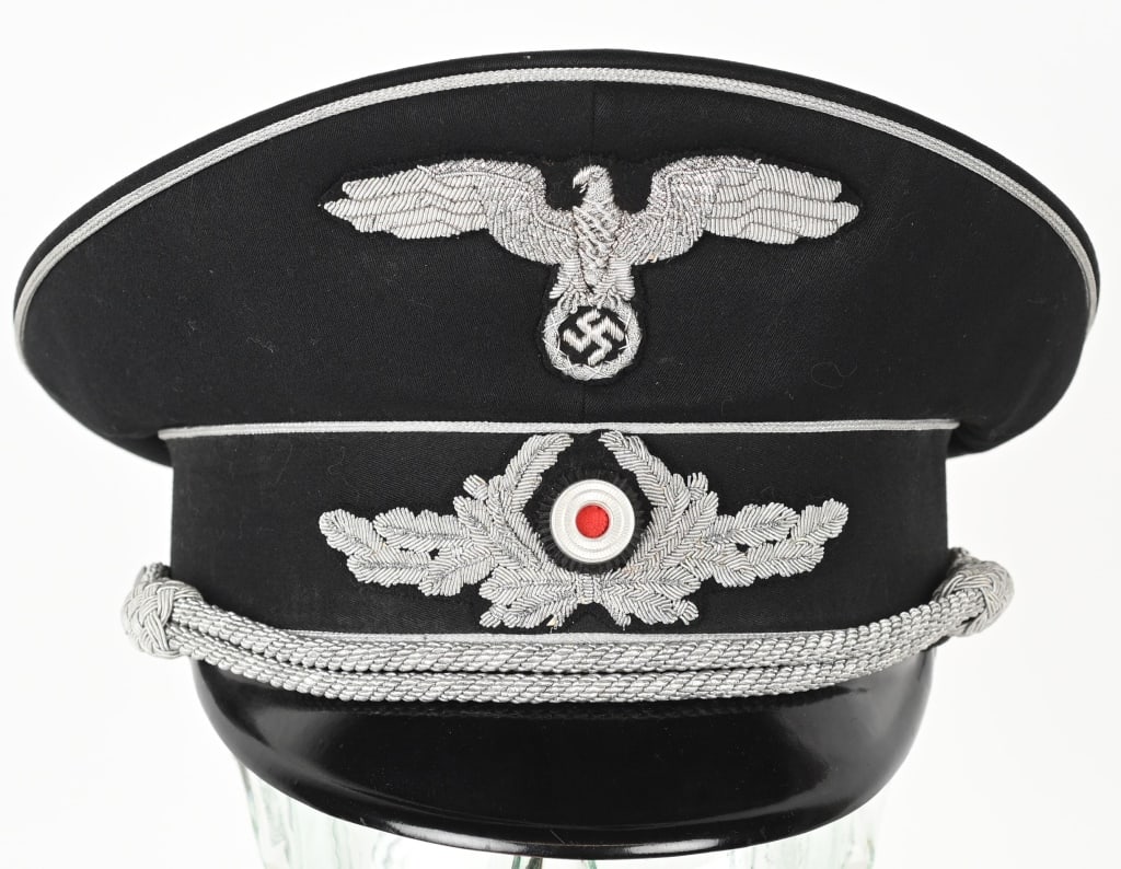 WWII NAZI GERMAN JUDICIAL OFFICERS VISOR HAT WW2: Named WWII Nazi German Judicial Officer's Visor Hat. Nice quality, black wool construction visor cap by Robert Lubstein. The front center of the centerband has a hand embroidered oak-leaf wreath 
