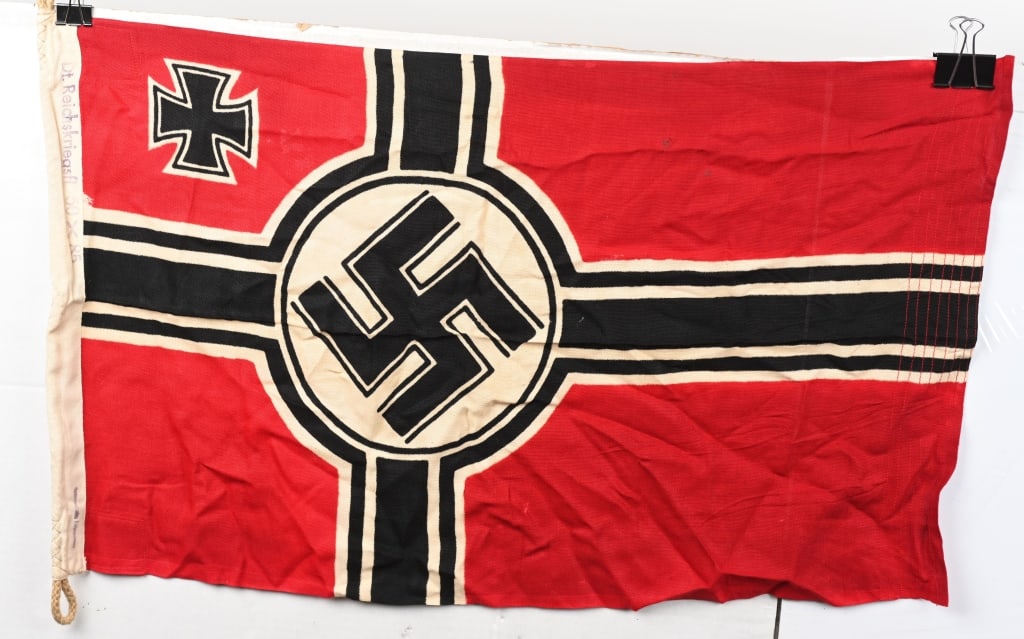 WWII NAZI GERMAN KRIEGSMARINE BATTLE FLAG .50X85: Second pattern (Circa 1937/38-1945) single piece dual sided printed cotton/linen construction national war flag. The flag features a red base field with a central white/black/white/black bordered whit