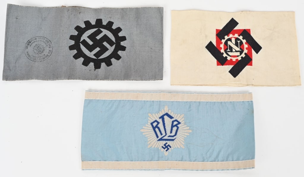 WWII NAZI GERMAN RLB DAF TENO ARMBAND LOT WW2: WWII Nazi German Armband lot to include 1) RLB OFFICER'S ARMBAND. First pattern, (circa 1933-1939), mid-blue cotton construction RLB Officer’s armband features a machine embroidered f