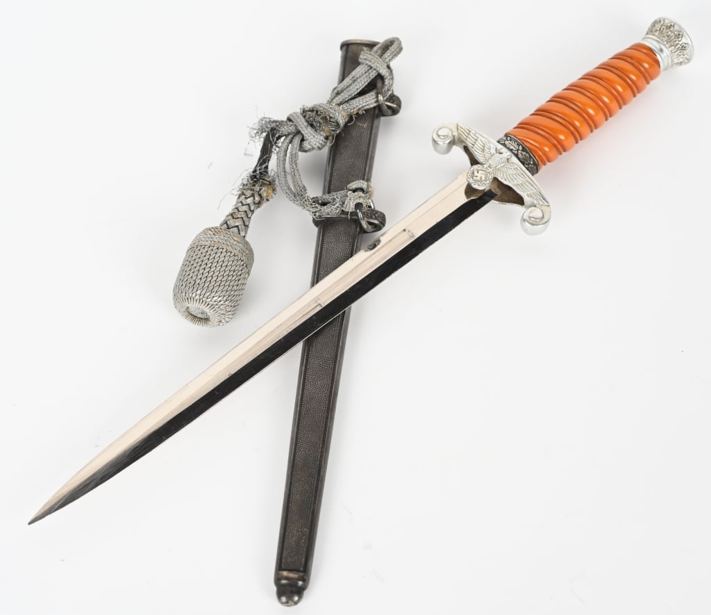 WWII NAZI GERMAN ARMY OFFICERS DAGGER BY VOOS: The dagger features a roughly, 10 1/4", (26 cm), long, drop forged, steel construction, nickel/silver plated, stiletto style blade with a flat central ridge and a full length, including the hilt, of r