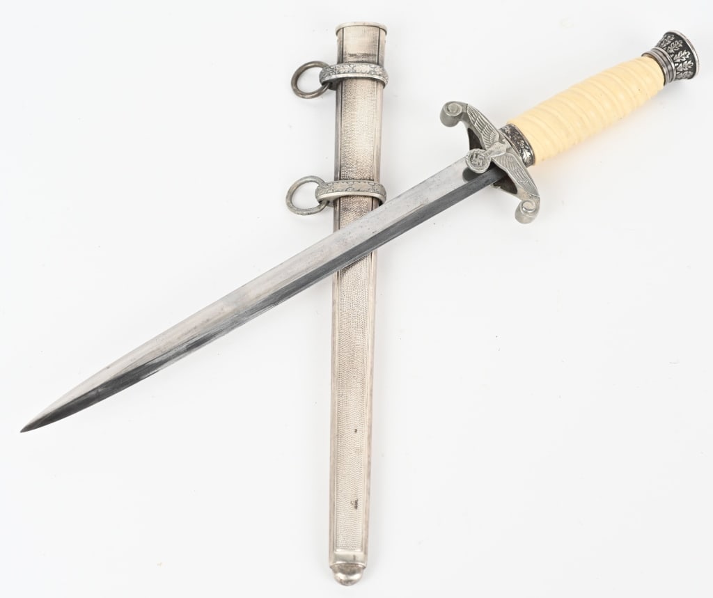 WWII NAZI GERMAN ARMY DAGGER BY SIEGFRIED WW2: The dagger features a roughly 26cm long drop forged steel construction nickel/silver plated stiletto style blade with a flat central ridge and a full length including the hilt, of roughly 38cm. Nice c
