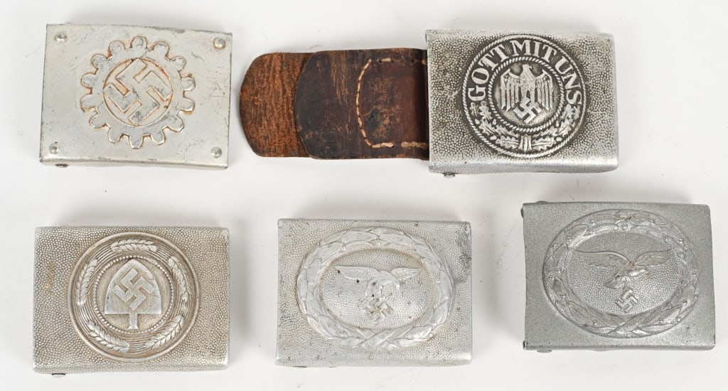 WWII NAZI BELT BUCKLE LOT LUFTWAFFE HEER DAF RAD: WWII Nazi German Belt Buckle lot to include 1) DAF BELT BUCKLE. Die stamped, Steel, box buckle features a plain field with a high relief, embossed fourteen tooth cogwheel encompassing a canted sw