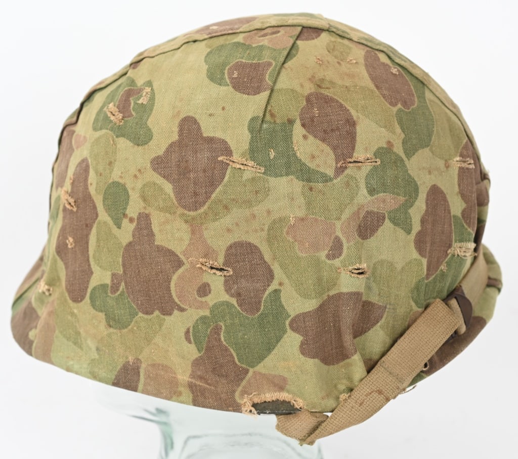WWII US MARINES M1 HELMET W USMC HBT CAMO COVER: Front seam Fixed Bale M1 helmet with a United States Marine Corps HBT camouflage cover. Westinghouse liner. Excellent. This helmet came from the same estate as the Paramarine smock in the next lot. Th