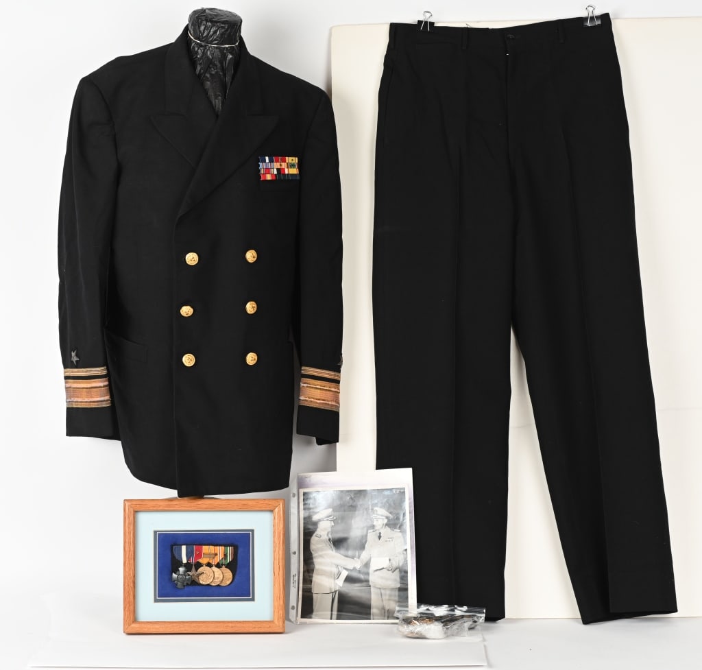 WWII US NAVY CROSS WINNER NAMED GROUP MEDALS WW2: Stellar WWII Naval Medal grouping of Rear Admiral William C. Butler who received the Navy Cross. The uniform that accompanies the medal bar is Post War dated 1956 but both uniform jacket and trousers 