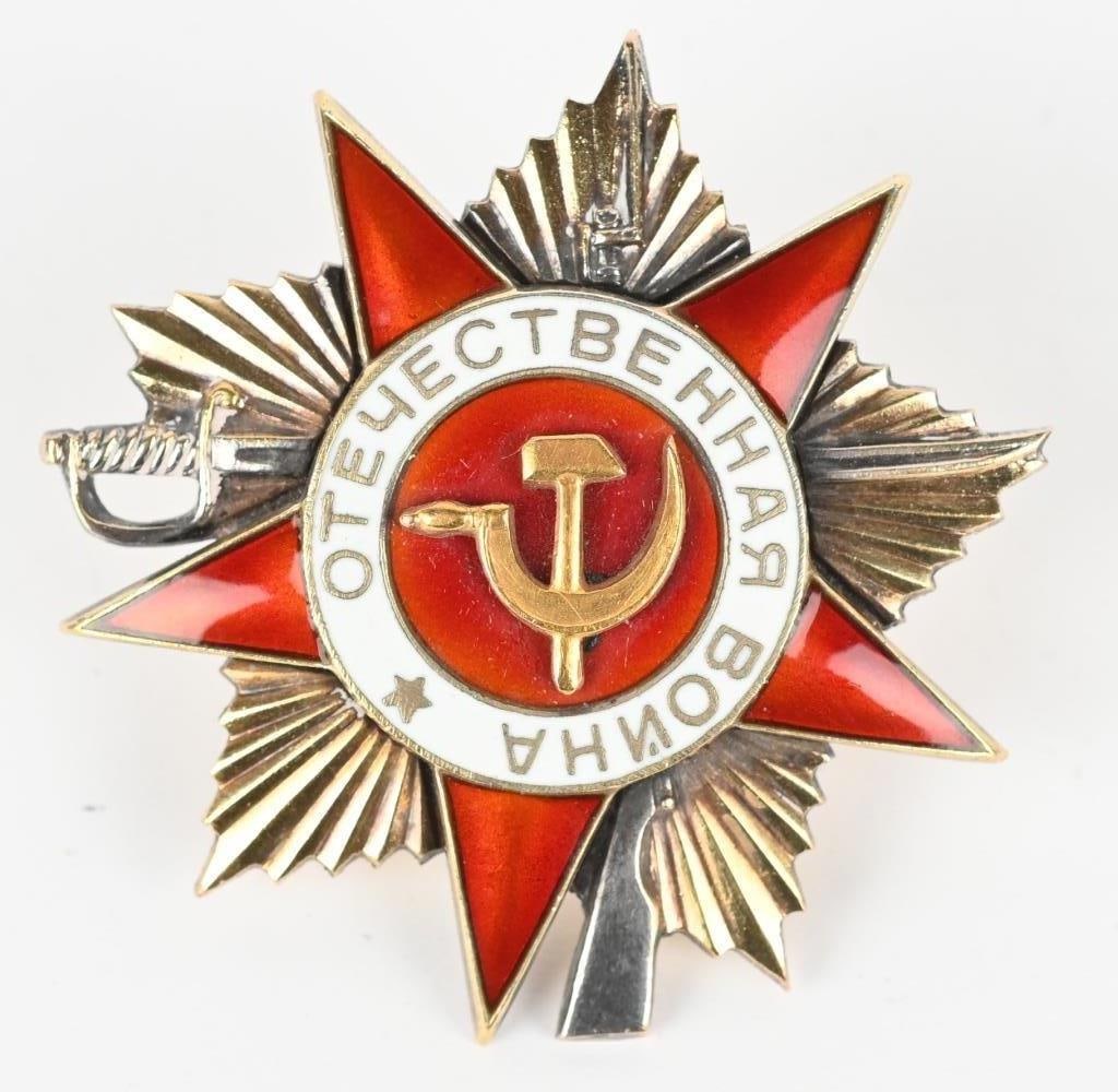 SOVIET UNION ORDER OF THE PATRIOTIC WAR 1ST CLASS: (Soviet Union, USSR): Type 2; Three-piece construction, Gold and silver with red and white enamels, Monetny Dvor mint marked and number engraved "282210" on the reverse, 43 mm x 46 mm, screwback. Extr