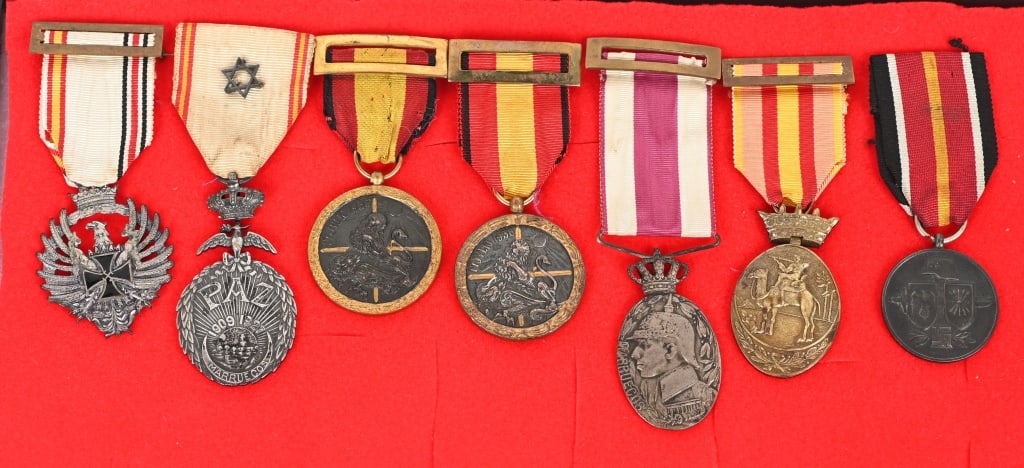 SPANISH MEDAL LOT BLUE DIVISION PEACE WITH MOROCCO: SPANISH MEDAL LOT TO INCLUDE 1) SPANISH COMMEMORATIVE FOR PEACE WITH MOROCCO 1909-1927 WITH STAR CITATION. SPAIN: Medal for the Peace of Morocco (1909- 1927). With star citation on the ribbon. O