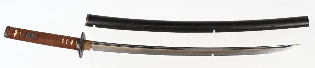 JAPANESE KATANA SWORD w/ SIGNED TANG: The Katana has a 23 1/8" cutting edge. This sword size is right on the cusp between a Wakazashi and Katana. Early blade with 1 hole tang signed on one side. Hizen made. The bright blade has a keen cut