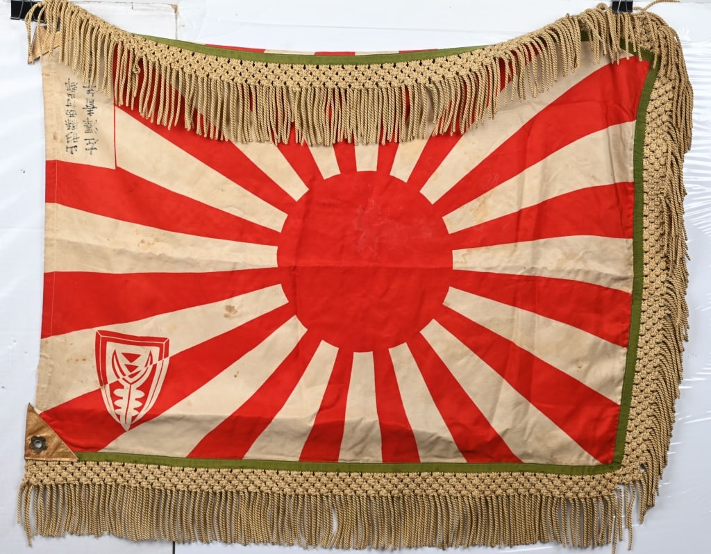 WWII IMPERIAL JAPANESE RISING SUN FLAG W FRINGE: WWII Imperial Japanese Rising Sun Flag measuring 27 X 38 inches excluding the white silk fringe and is double sided with heavy leather reinforced corners with Chrysanthemums. Excellent. 