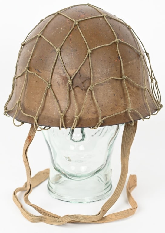 WWII IMPERIAL JAPANESE TYPE 90 COMBAT HELMET WW2: The standard WWII Japanese infantry combat helmet. The shell constructed from chrome molybend steel shows loads of period wear and combat use. The original IJA metal star affixed to the front. The thr