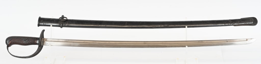 WWII JAPANESE M1889 TYPE 32 CAVALRY SWORD WW2: The Japanese Model 1889 Type 32 cavalry sabre has a machined blade with a katana-like tip. The sword was in service during the Russo-Japanese War, World War One and World War Two. Two patterns of the 