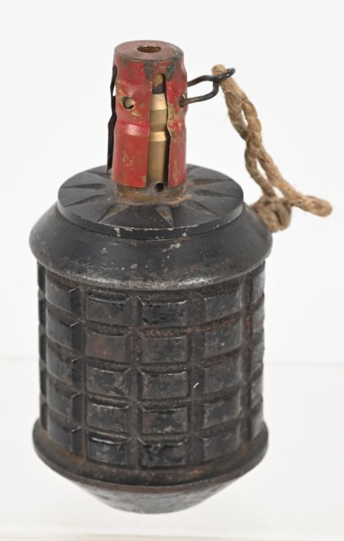 WWII JAPANESE INERT TYPE 97 HAND GRENADE COMPLETE: INERT WWII Japanese Type 97 hand grenade with original fuse assembly. Excellent. History and development The Type 97 was developed from the earlier Type 91 Grenade which could also be used as a fragme