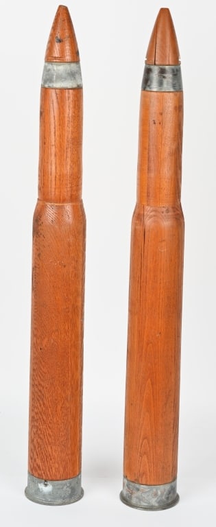 LOT OF 2 WOODEN NAVY MK 6-50 TRAINING ROUNDS: LOT OF 2 WOODEN MK 6-50 Training rounds, Used for the Anti U-boat crews of the US Navy starting in 1940. Rounds are marked on the bottom. 329486 G.F.J V.M.C. 1944 DUMMY CARTRIDGE MK 6-50 CAL. with a A