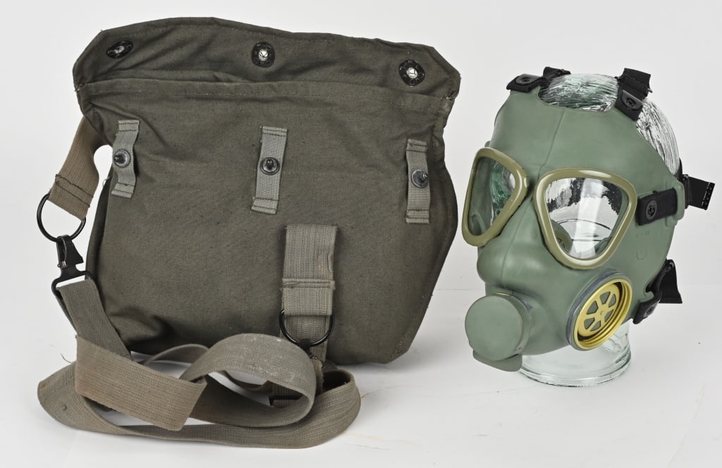 COLD WAR EASTERN EUROPE MILITARY GAS MASK 1961: Eastern europian military gas mask with carrier and ONE filter cartridge. Comes with manual and decon rag. Nice Item to add for Cold War collection.