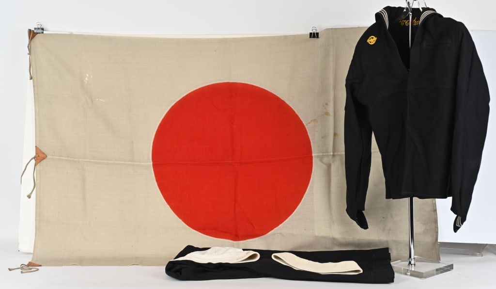 WWII US NAVY UNIFORM & IMPERIAL JAPANESE FLAG LOT: Lot to include 1) US Navy WWII Enlisted Blue Jumper uniform named to C.C. Stanton and is in excellent condition. The uniform has a 3rd class Gunner's Mate Naval Rating to the sleeve and a ru