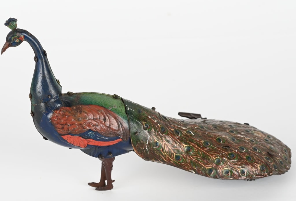 EBO PAO PAO TIN WINDUP PEACOCK: All original with nice colors. Windup works. Bellows not working. 10 1/2" Excellent