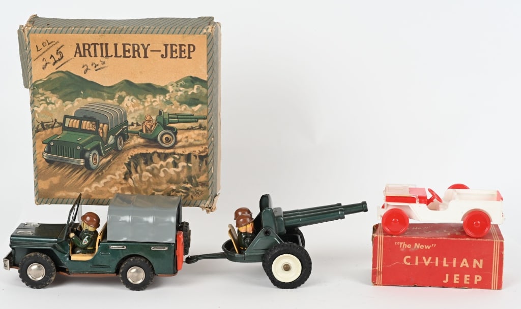 JAPAN TIN FRICTION ARTILLERY JEEP w/ BOX: All original Jeep and Artillery Gun. Friction works. Boxed. Comes with Plastic Civilian Jeep with Box. Largest 8" Excellent
