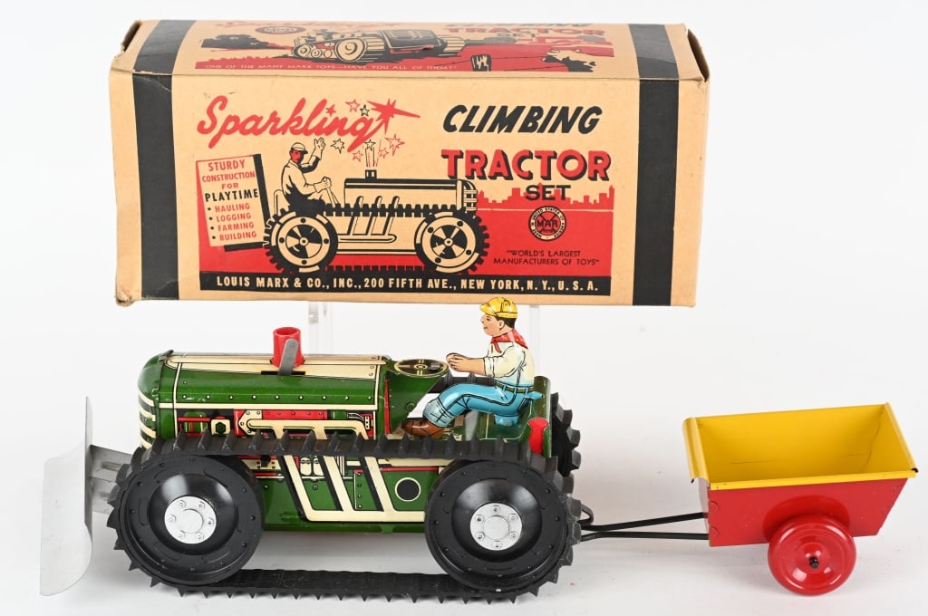 MARX TIN WINDUP SPARKLING CLIMBING TRACTOR w/ BOX: Looks never played with condition. Comes with Trailer. Worked when tested. Boxed 11" Excellent