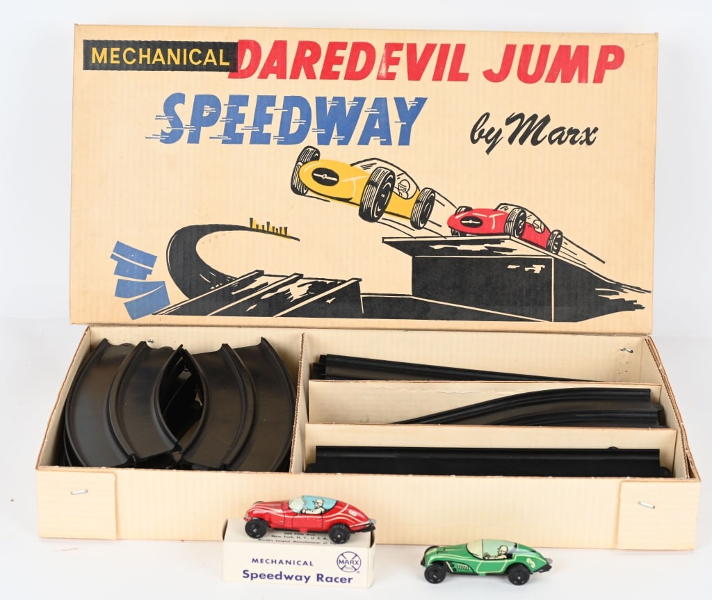 MARX DAREDEVIL JUMP SPEEDWAY w/ BOX: All original and complete with 2 windup cars and track. Boxed 21" Excellent