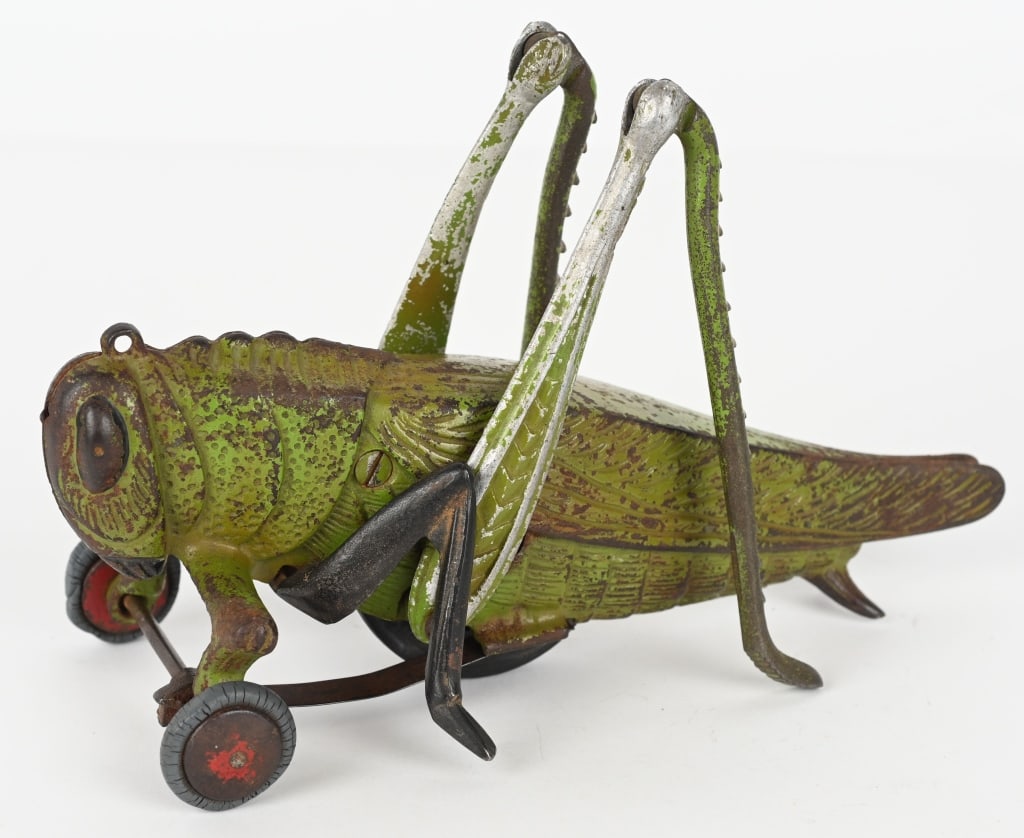 HUBLEY CAST IRON GRASS HOPPER: All original with no breaks or repairs. Has decent paint. 11" Very Good-Excellent