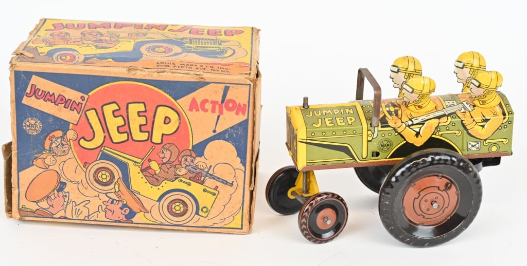 MARX TIN WINDUP JUMPIN JEEP w/ BOX: All original and complete. Windup works. Colorful box missing part of end flap. 6" Excellent