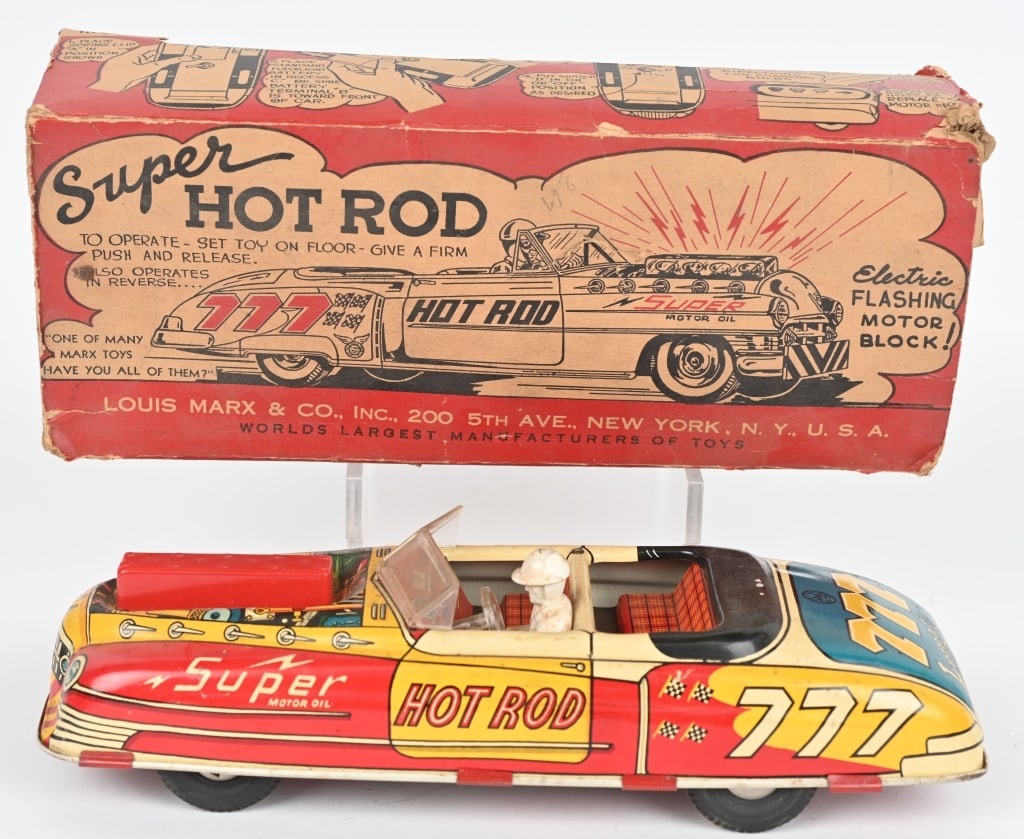 MARX TIN FRICTION SUPER HOT ROD W/BOX: The toy is complete and original with working friction motor. Nice colors and lights are untested. Graphic original box is incomplete with wear. 11" Excellent
