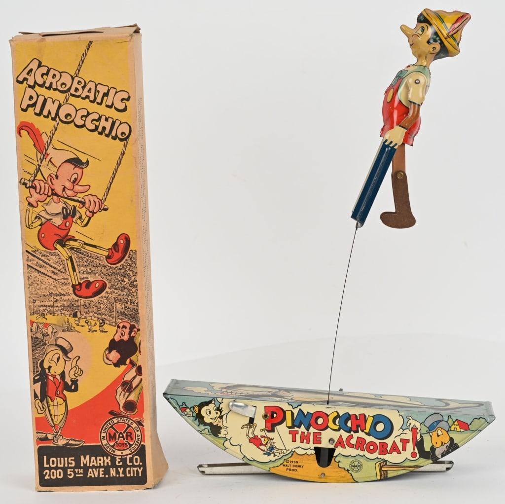 MARX TIN WINDUP PINOCCHIO ACROBAT w/ BOX: Marx tin windup Walt Disney's Pinocchio Acrobat. All original and complete. Great colors and Pinocchio Character graphics. Windup works. Includes scarce original box that missing part of bottom flaps 