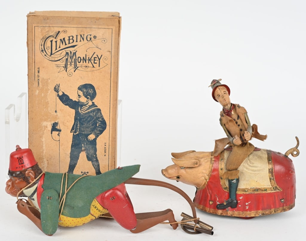 LEHMANN PADDY AND PIG & CLIMBING MOKEY w/ BOX: Lot includes 1. Paddy and Pig, complete and original except for one missing leg. Windup works. 2. Climbing Monkey with box. Untested, nice condition but missing tassel on hat. Includes original box. L