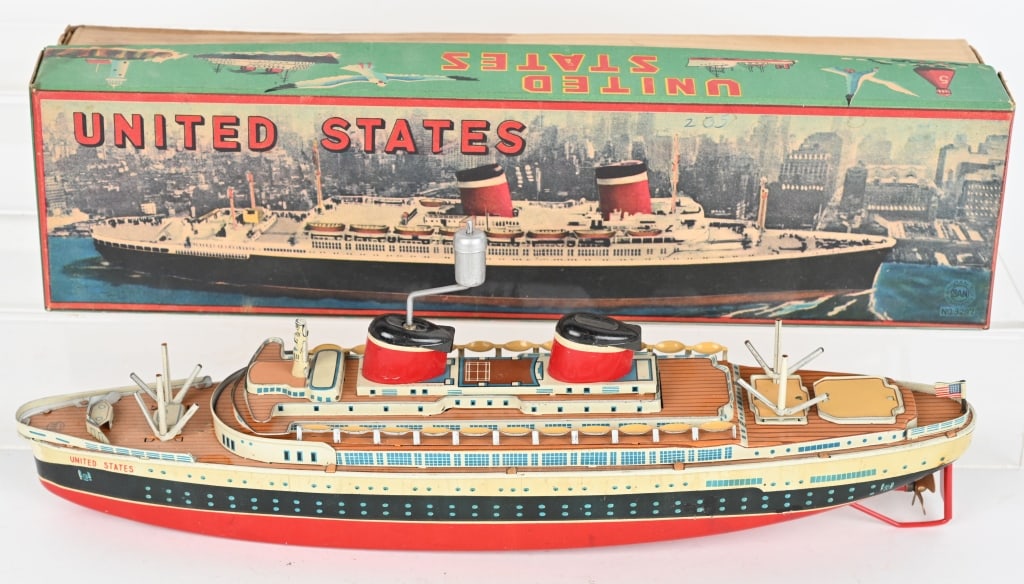 JAPAN SAN TIN WINDUP UNITED STATES SHIP w/ BOX: Scarce very detailed Japan tin ship. Windup worked when tested. Includes nice graphic original box. 15" Excellent