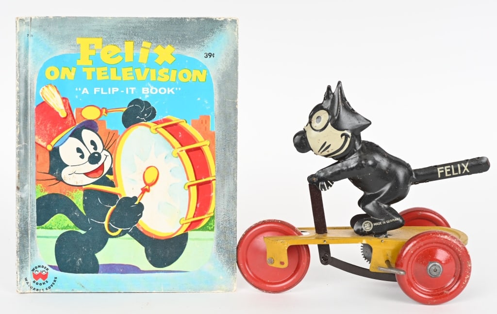 GERMAN GUNTHERMANN TIN WINDUP FELIX THE CAT: All original Gunthermann felix the Cat on scooter. Windup works well. Very clean example. Has some wear on wheels. 7" Excellent