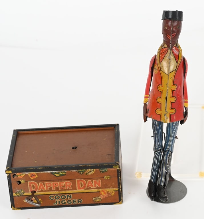 MARX DAPPER DAN TIN WINDUP PORTER JIGGER: The toy is all original and worked when tested. Missing the wire rod that connects the figure to the base. 10" Very Good-Excellent