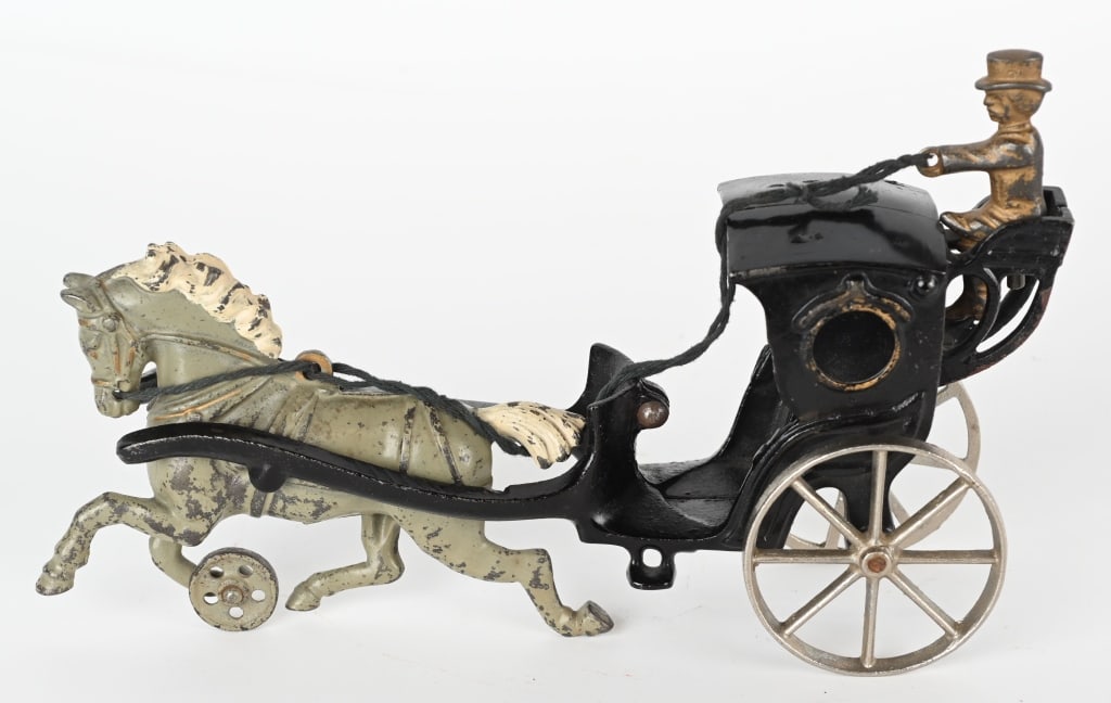 HUBLEY CAST IRON HORSE DRAWN HANSOM CAB: Very nice all original Hansom cab made by Hubley. Nice original paint and no cracks or repairs. 11" Excellent