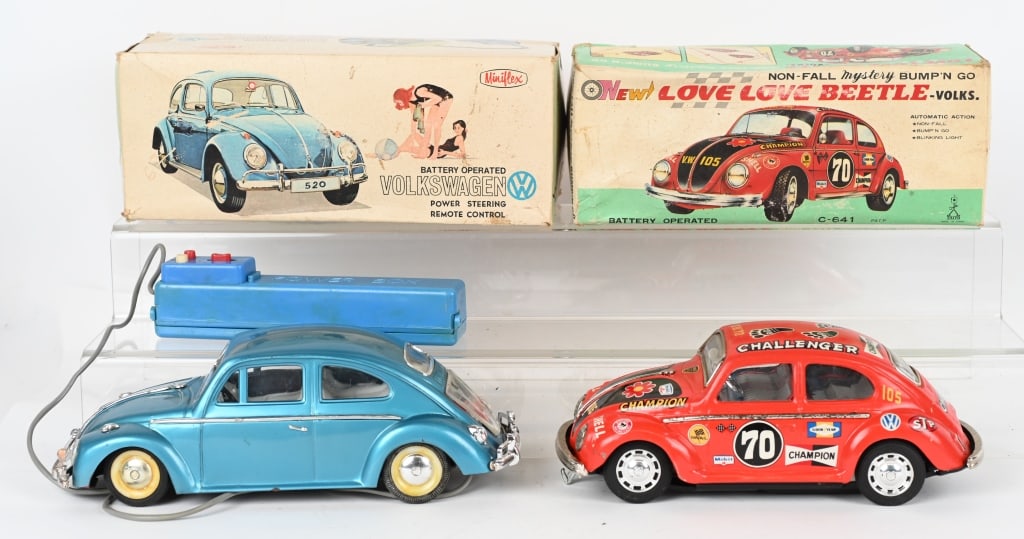 2- BATTERY OP VW BEETLES w/ BOXES: Lot includes: 1. 9 1/2" Japan tin Love Love Beetle, not working, 2. 10" Hong Kong plastic Beetle working Both Excellent