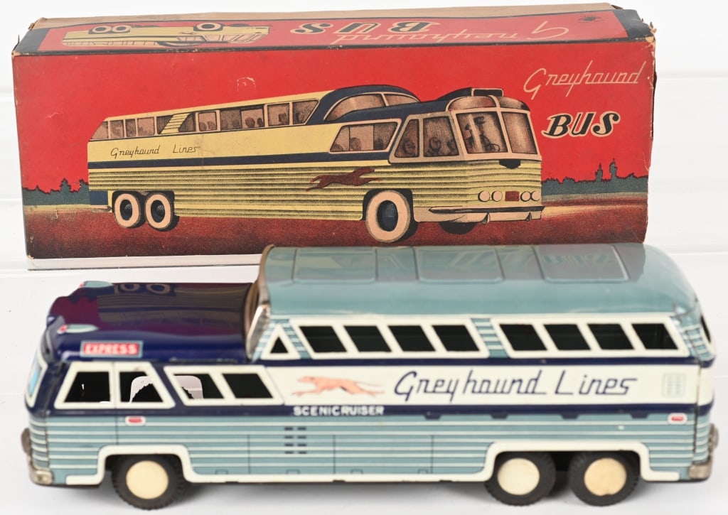 JAPAN TIN FRICTION GREYHOUND BUS w/ BOX: The bus is complete and original and worked when tested. Original box has great graphics, and some tape on one end . 11" Excellent