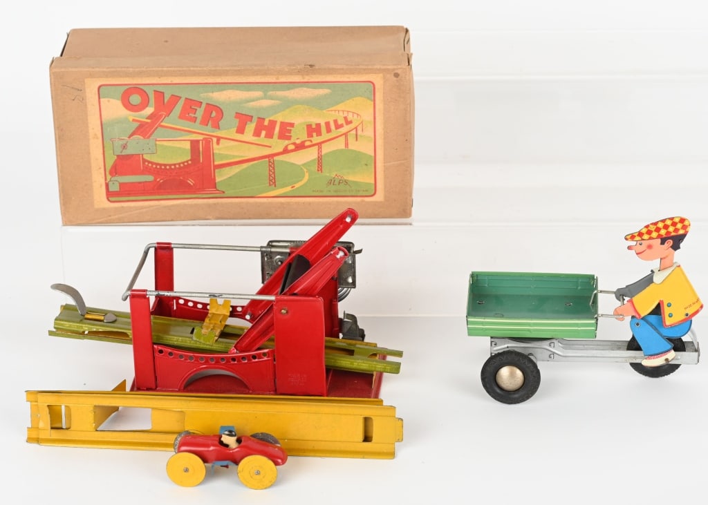 2- TIN MECHANICAL TOYS, GERMAN & JAPAN: Lot includes 1. Occupied Japan windup Over The Hill, working, Includes original box. 2. Western German Friction Man on Cart, working. Both Excellent