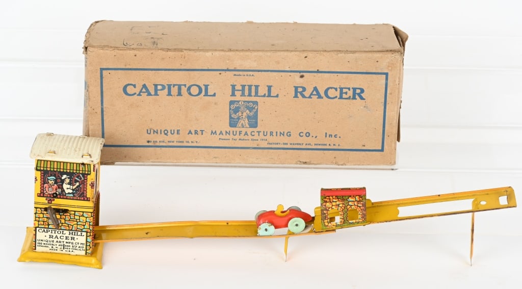 UNIQUE ART TIN WINDUP CAPITAL HILL RACER w/ BOX: The toy is complete and original. Windup worked when tested. Has some play wear and may clean to a higher grade. Good original box. 10' Very Good-Excellent