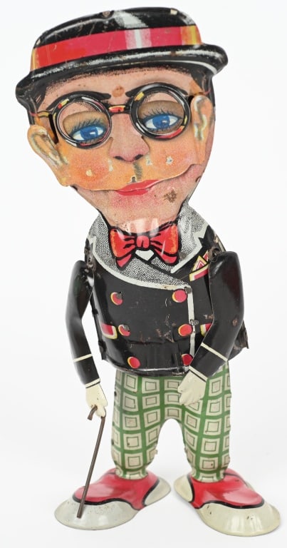 MARX TIN WINDUP HAROLD LLOYD WALKER: All original and complete with both arms. Windup works. 10 1/2" Excellent