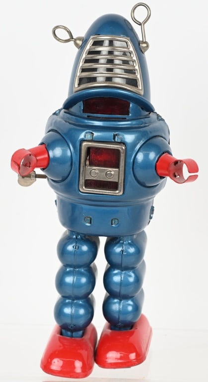 JAPAN TIN WINDUP PLANET ROBOT: All original and complete. Windup works. 8 1/2" Excellent