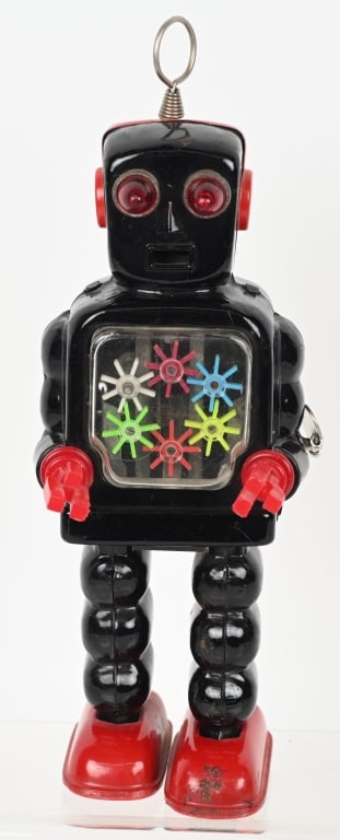 KO TIN WINDUP HIGH WHEEL ROBOT: All original in great condition. Windup works. 10 1/2" Excellent