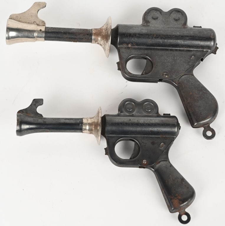 2- DAISY BUCK ROGERS ATOMIC PISTOLS: Includes different size versions. Both all original and work. Largest 10" Excellent