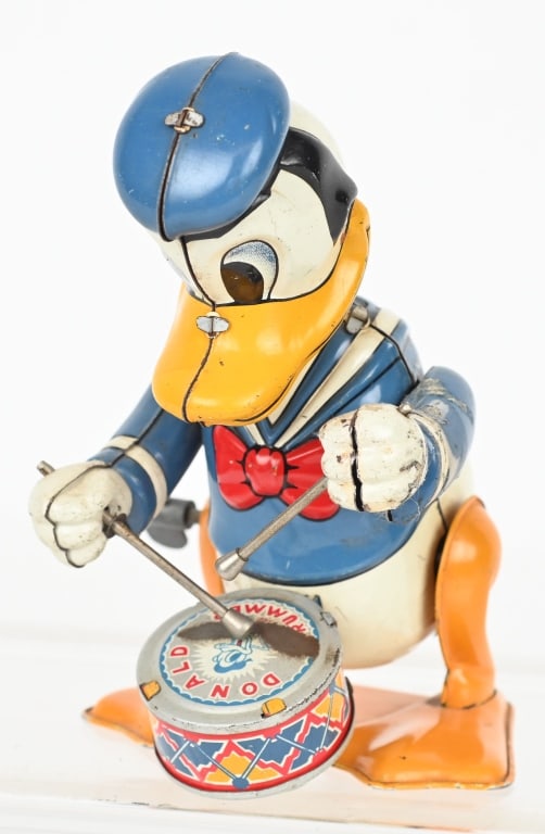 LINEMAR TIN WINDUP DONALD DUCK DRUMMER: All original in great shape. Windup works. 5 1/2" Excellent