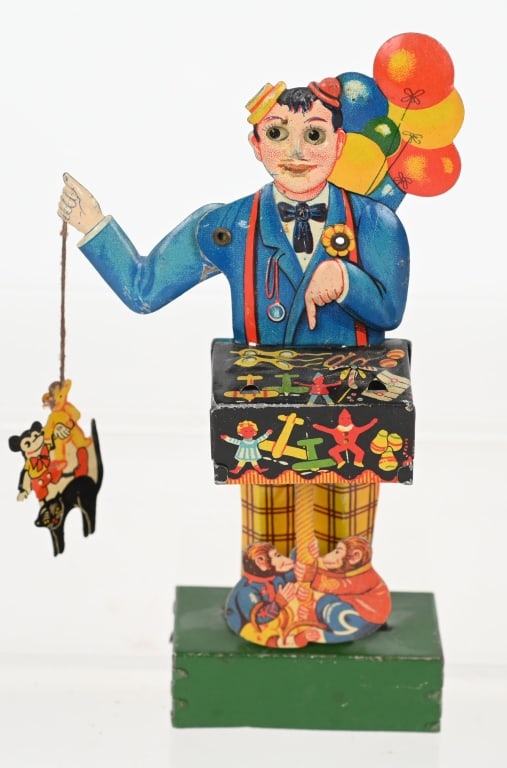 GERMAN TIN WINDUP BALLOON VENDER w/ MICKEY MOUSE: All original and complete with Mickey Toy Bundle. Works. 6 1/2" Excellent